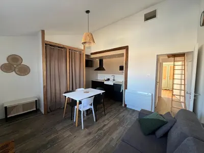 Coin salon dans l'établissement Les Iris - Maison chaleureuse