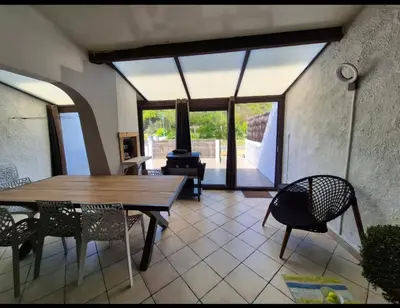 Coin salon dans l'établissement Maison cosy proche plage
