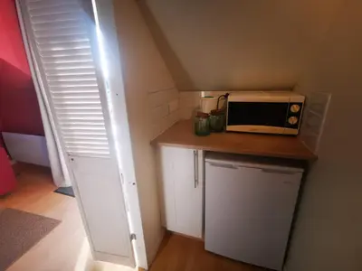 Cuisine ou kitchenette dans l'établissement Le studio