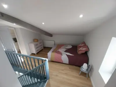 Un ou plusieurs lits dans un hébergement de l'établissement Chez Lilian & Isa - Gîte 6 - 8 personnes