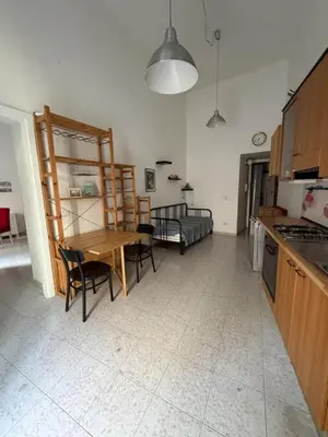 Cuisine ou kitchenette dans l'établissement Noble Square Apartment