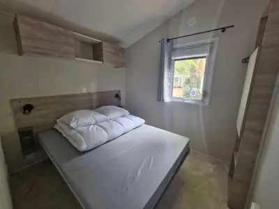 Un ou plusieurs lits dans un hébergement de l'établissement Mobil Home 4 Pers., Terrasse et Parking, St Jean de Monts - FR-1-777-44