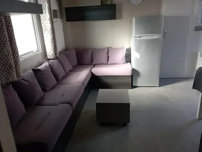 Coin salon dans l'établissement Mobil-home 6 personnes Camping 4 etoiles