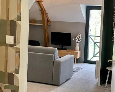 Coin salon dans l'établissement L'Appart'Anjou