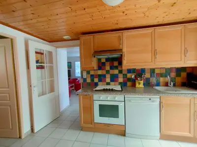 Cuisine ou kitchenette dans l'établissement CHAMBrE CHEZ L'HABITANT