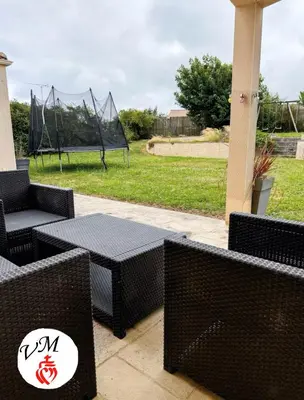 Coin salon dans l'établissement Maison contemporaine proche du PuyduFou