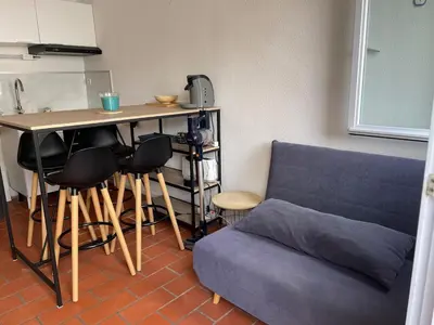 Coin salon dans l'établissement Maisonnette de Plage