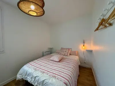 Un ou plusieurs lits dans un hébergement de l'établissement Éclatant Apt 5 pers avec Balcon et Garage - FR-1-323-599