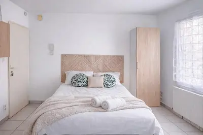 Un ou plusieurs lits dans un hébergement de l'établissement Le Nid Vendéen - Cozy studio 2-4 pers 15 min du Parc