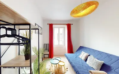 Un ou plusieurs lits dans un hébergement de l'établissement Lovely studio near Nantes city center