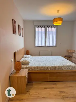 Un ou plusieurs lits dans un hébergement de l'établissement Tranquiloue - Gite 15 personnes - 10min Puy du Fou