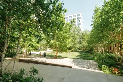 Jardin de l'établissement Appartement lumineux et calme au pied des Machines