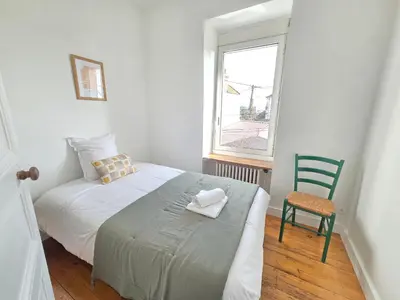 Un ou plusieurs lits dans un hébergement de l'établissement La Maison de l'Île, calme & atypique, proche Loire