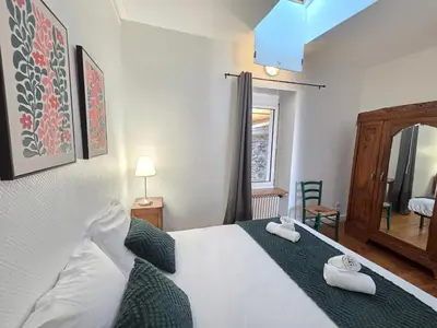 Un ou plusieurs lits dans un hébergement de l'établissement La Maison de l'Île, calme & atypique, proche Loire