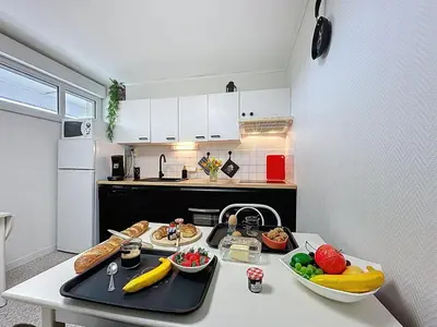 Cuisine ou kitchenette dans l'établissement Apartment L'Ermitage-4 by Interhome