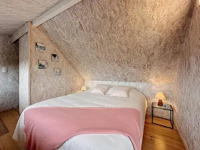 Un ou plusieurs lits dans un hébergement de l'établissement Apartment Le Saint Gilles by Interhome