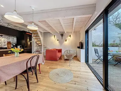 Coin salon dans l'établissement Apartment Le Saint Gilles by Interhome