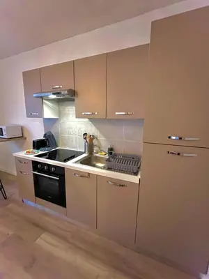Cuisine ou kitchenette dans l'établissement La Palmeraie - T2 Saint-Nazaire
