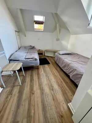 Un ou plusieurs lits dans un hébergement de l'établissement Fully equipped 1-bedroom apartment near Chantiers Navals