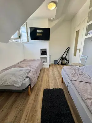 Un ou plusieurs lits dans un hébergement de l'établissement Fully equipped 1-bedroom apartment near Chantiers Navals