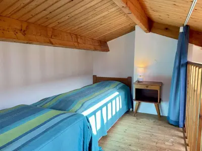 Un ou plusieurs lits dans un hébergement de l'établissement NO000-2CG Mais 2 pièces mezzanine - 4 couchages NOIRMOUTIER EN L'ILE