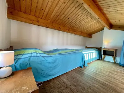 Un ou plusieurs lits dans un hébergement de l'établissement NO000-2CG Mais 2 pièces mezzanine - 4 couchages NOIRMOUTIER EN L'ILE