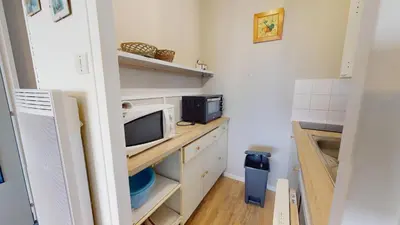 Cuisine ou kitchenette dans l'établissement Acapulco en bord de mer