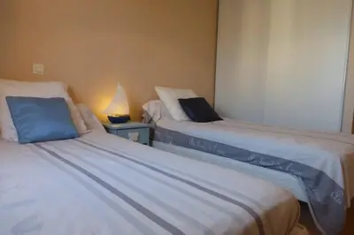 Un ou plusieurs lits dans un hébergement de l'établissement SG000-015 Mais 4 pièces 7 couchages SAINT GILLES CROIX DE VIE