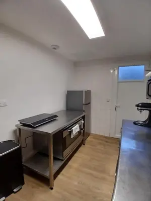 Télévision ou salle de divertissement dans l'établissement Appartement Vivre un moment face au château