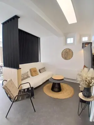 Coin salon dans l'établissement Appartement Vivre un moment face au château