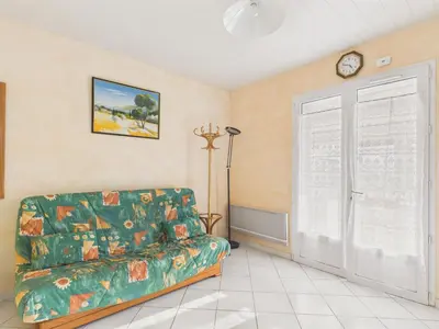 Coin salon dans l'établissement Maison pour 5 avec jardin, plage à 500 m