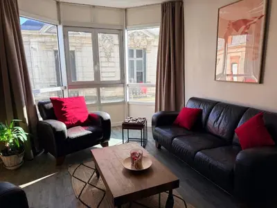 Coin salon dans l'établissement AU CHOLETAIS T2-50m2 - Déco originale - 20mn Puydufou