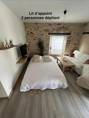 Un ou plusieurs lits dans un hébergement de l'établissement Appartement cosy