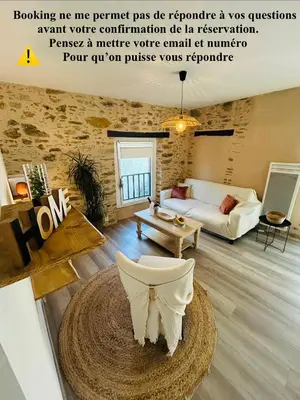 Coin salon dans l'établissement Appartement cosy