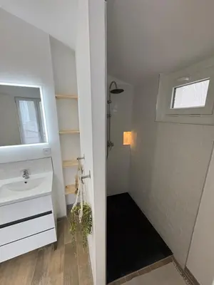 Salle de bains dans l'établissement Petite rivière