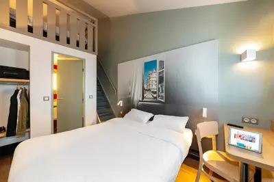Un ou plusieurs lits dans un hébergement de l'établissement B&B HOTEL Angers 1 Beaucouzé