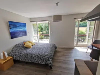Un ou plusieurs lits dans un hébergement de l'établissement Moulin Pont Vieux Chambres d'hôtes