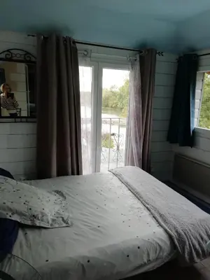 Un ou plusieurs lits dans un hébergement de l'établissement Gîte des pêcheurs