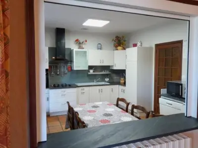 Cuisine ou kitchenette dans l'établissement Gîte Nolan
