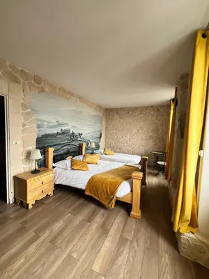 Un ou plusieurs lits dans un hébergement de l'établissement Hôtel de Bretagne