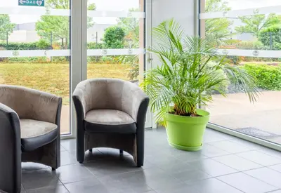Coin salon dans l'établissement B&B HOTEL Nantes Savenay