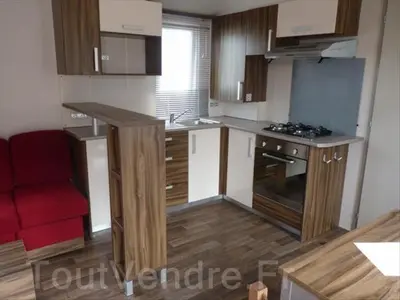 Cuisine ou kitchenette dans l'établissement Mobil Home