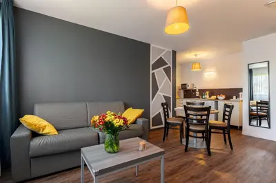 Coin salon dans l'établissement Zenitude Hôtel-Résidences Nantes Métropole