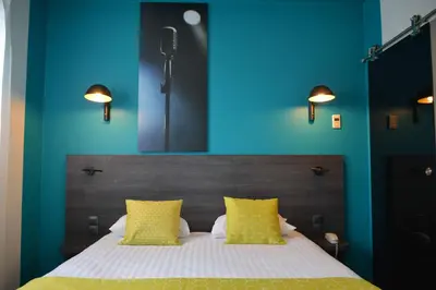Un ou plusieurs lits dans un hébergement de l'établissement Best Western Hotel Atlantys Zenith Nantes