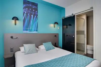 Un ou plusieurs lits dans un hébergement de l'établissement Best Western Hotel Atlantys Zenith Nantes