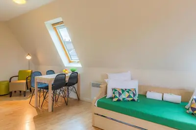 Un ou plusieurs lits dans un hébergement de l'établissement Appart’City Confort Nantes Centre