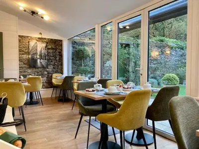 Coin salon dans l'établissement Hôtel Coeur De Loire