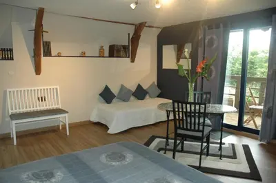 Un ou plusieurs lits dans un hébergement de l'établissement Chambre d'Hôte La Boulière