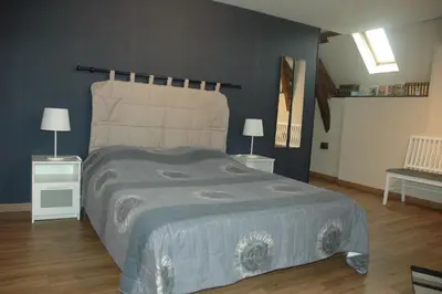 Un ou plusieurs lits dans un hébergement de l'établissement Chambre d'Hôte La Boulière