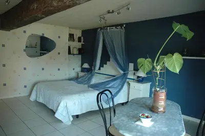 Un ou plusieurs lits dans un hébergement de l'établissement Chambre d'Hôte La Boulière